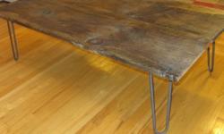 Brand new coffee table, never used, assembled this week . Made from 200 year old roughsawn barnwood. You can still see the saw marks made in the early 1800s. This one of a kind "conversation piece" is made with unique steel rebar hairpin legs. Table top