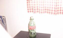 A great Coke Cola collection for sale. Diedel train set new
in box, Serving trays, Set of Coke Cola dinner ware still
packed in box,One 64 oz Coke bottle never used by Coke very rare, Several set of Coke glasses, 24 bottle wooden case, one wooden six pack