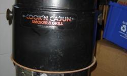 HAVE A GREAT PROPANE SMOKER
JUST IN TIME FOR GRILLIN' SEASON!
FIRE IT UP WITH SOME MESQUITE CHIPS IN THE WATER TRAY AND ADD SOME RIBS OR CHICKEN ON THE COOKING GRILL!!!
YOU'LL HAVE THE NEIGHBORS BANGIN' AT YOUR
DOOR IN NO TIME!!
GOT TO MOVE ON, SO ONLY