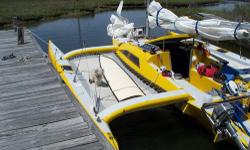 Great Boat Never raced,lightly used
New Trampolines
All Harken Hardware
4 Harken 2 Speed self tailing winches
Fully battened main ~ 2 Jibs one never used ~ Screecher never used
Carbon fiber retractable bowsprit ~ Swing keel -Kick up rudder ~ Honda 5hp