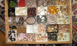 Clearing out costume jewelry....
A MISCELLANY OF NECKLACES plus bracelets and some rings. Faux pearls seed bead weaves. glass beads. ceramic beads. shell beads. crystals. camel bone. ethnic pieces. pendants. more most $3 to $5 none more than $8 OR TAKE