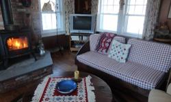 Furnish your country home with these two rustic-style (but well-maintained) cherry-stained couches with burgundy plaid back cushions and seats. 66" high x 32" wide. Coffee table is made in same style and measures 40" round.
For pick up only.
