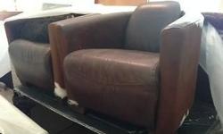 Set of two cowhide and leather chairs. Great condition.
