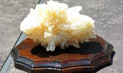 Crystal- 6 sided straight crystals crossing each other. Size 4 Â½? X 6? wide and 2 Â½? thick on a wooden base 6 Â¾? x 5? This lovely crystal comes from the country of Peru and would make a lovely gift. Healing Crystals. This piece is full of clear points