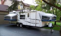 Excellent condition 2006 hybrid camper! Newly past NYS inspection of vehicle and all appliances, new seals around all fold outs and newly packed tires!! Has 3 fold out queen beds and slide out couch. Full kitchen with oven, stove top, microwave and