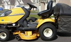 Cub Cadet i1046 Zero Turn Lawn Tractor with double-bagger attachment. It's the best of both worlds: easy to operate because it drives just like a standard lawn tractor, but has zero turn functionality too! Only 120 hours on it, well-maintained, just