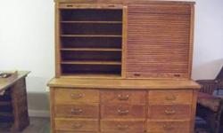shelves as shown with pull-opit writing board, drawers and cabinets below for stprage. c. 1950. excellent condition.