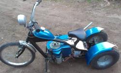 this is one of a kind, custom built mini chopper/trike, started it in fall of 2011, finished in the summer of 2012. modified schwinn frame to fit the 8hp briggs engine. also schwinn front end. the engine comes all wired up with electric start. the