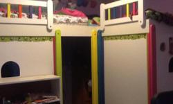 his is a great loft bed for a boy or a girl or twins!
This was a custom-made loft bed for 2 twin beds in an L-shape and includes play space underneath.
There is a small set of 8 stairs to get up (17 inches wide), as well as a fire pole.
There are walls