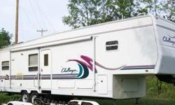 1997 Damon Challenger 33RKB 5th Wheel Camper. 35 foot, Super Slide (Kitchen table & Couch), Bedroom Slide, awning, furnace, central air conditioning, Hide away bed couch (NOT the uncomfortable sissor couch), kitchen table with 4 chairs, queen size bed, 10