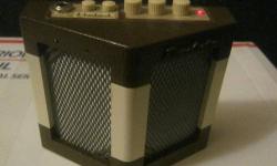 Danelectro Hodad DH-1 mini guitar practice amp. NEAT LITTLE AMP! Features twin speakers, echo effect, vintage tremolo with adjustable speed.
Good condition but missing 1 logo on front and the on/off/volume switch is touchy sometimes but not all the time.