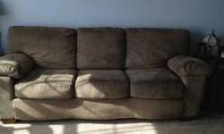 Dark brown high quality leather Natuzzi sofa and loveseat from Bon-Ton. Love seat has 1/2" small cut in lower seat back - otherwise excellent condition - non smoking home. Sofa is 86 x 36 x 33 loveseat is 63 x 36 x 33. Color is dark brown - variation in