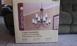 Two brand new and in the box 9-light chandeliers for sale. Asking $150 each (originally $259). They are a Dark Oil-Rubbed Bronze Finish. Please contact me for more info.