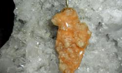 Deep Goldish/Orange Citrine Crystal Cluster Charm. This is a Beautiful Charm hand Crafted by Paulsgems with a Gold Crown on Top. This Crystal Charm would look Beautiful on around your neck on your gold or silver chain and especially it?s a one of a kind.