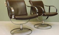 Chrome and leather chairs by Warren Planter, the designer famous for his steel wire furniture. These chairs were designed for Steelcase in the mid 1960s. Original brown leather supported by a solid polished steel frame. Very heavy. Single tubular leg