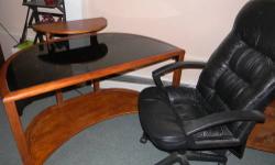 This is a very sturdy computer desk with a comfortable leather computer chair. The desk as a black glass top. My husband sanded it down and refinished it. Very nice piece of furniture. The leather chair is in great condition, no fading or tears or rips at
