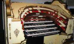 The 4 manual French (tombstone) Style Console has 256 stop tabs. Among them are 2nd Touch on the Great, Accompaniment, Pedal with Pizzicato on Great and Accompaniment. Ten Tremulants. There are 14 toe pistons, 6 piano stylee foot levers. Two with 2nd