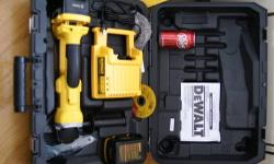 New never used, in original packaging, DEWALT DC413KL 28-Volt Lithium Ion (Li-ion) Cordless Cut-Off Kit. Batteries were charged but tool was never used. Was $469.99. Comes with cut off tool, charger, two 28 Volt batteries, shield, 1 cut off disc and disc