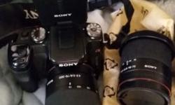 Sony A100 DSLR This is a great camera I paid over 1400 for everything. I have only used it for family wedding and portraits. This camera takes great photos and also video. THE SET INCLUDES: camera body and 2 lenses a17 to 35 and a 35 to 300 zoom.i also