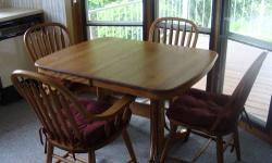 Dining Room Set (11 pieces) by Richardson Bros. Co. Sheboygan Falls, WI. Includes table, 1 armed chair, 3 chairs, 4 cushions, buffet table and china cabinet. Circa 1992. Made of oak and stained in a medium hue. This set never raised any children, so the