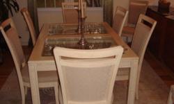 Dining Room Set including table, eight chairs, and breakfront. Like new condition.
Chandelier for sale also $300.00