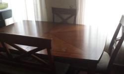 Dining room table with 3 chairs and bench.. comes with extra leaf. Could sit 8. Sturdy!! Chairs could use to be reupholstered.