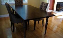 Dining Set - Quality wood dining table purchased from Pottery Barn earlier this year in brand new condition. Like new 4 "Lumiere" dining chairs from Pier 1 purchased earlier this year. Selling table and 4 chairs for $900. Buyer to pick up and cash only