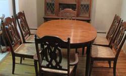 dinning room set , table with expansible section. 6 chairs (2 arm and 4 reg.) all in good condition. owner moving must go!