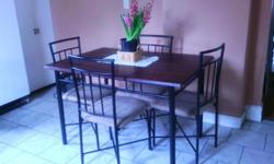 This is a very good condition ( like new ) dinning table, chairs are cushion with light brown and very comfortable. Its really a nice set. Text if interested. Thnk u.