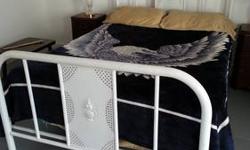 This is an old, metal bed. It is a double size. It comes with the headboard, footboard and side rails. The mattress and boxspring are not included. There is a really nice detail design in both the headboard and footboard.
The bed is 52 inches wide. The