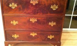Beautiful, Chippendale, ANTIQUE, Mahogany, Chest of Drawers. The wood grain is magnificent!
Brass hardware accents the wood. A REAL BEAUTY!
35"H, 35"W, 18.5"D
Make a reasonable offer
