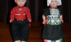Dutch boy and girl doll--about 8 1/2" tall.The original container in which they came says "Haly Elcee Made in Holland." Excellent condition from smoke-free home. Doll stands are included. Mirrored display cases are available for $7.00 each.