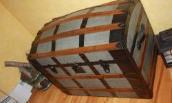 Completely restored and Beautiful early 1900's trunk/chest. Cedar lined and smells great. Has both handles (leather). 100% clean Makes a great piece of furniture in your home. Dome top. Made of metal,wood, cedar & punched metal. Great quality piece and is