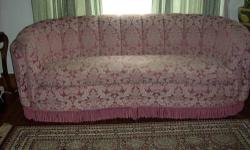 Absolutely beautiful full size 1900's Light Pink French Boudoir Style Curved Sofa.The cushion is 100% down and very comfortable. Cushion is also cut to fit the clam shell design on the back of the sofa. Sofa measures 87" long, 35" tall in the back and 34"