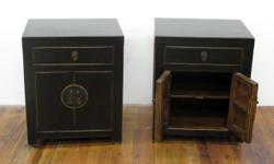 These simple, elegant cabinets are sized to suit bedside needs.
With one drawer on top and the lower compartment there is ample storage space.
The distressed black finish is accented with gold trim and brass hardware.
Conditon: Very good.
Dimensions: 19.5