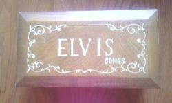 elvis presly wooden music box plays 8 different songs
in excellent condition asking for 500.00 or best offer