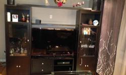 3 piece Entertainment Center with glass doors and glass shelves on both sides, has a lot of storage, great shape. Only few years old. It's from Raymour and Flanigan
. Adjustable to fit any size tv.
Furniture only
This ad was posted with the eBay