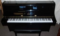 ESSEX (BY STEINWAY) CONSOLE PIANO, 2009
The Essex piano is designed by Steinway & Sons. This 2009 model is a fine example of the superior Steinway craftsmanship the makes these pianos so remarkable. It?s a truly well crafted instrument with a beautiful