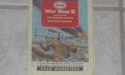 Esso War Map II Featuring The World Island & Fortress Europe- WW II Era - Illustrated.
Doubled sided map printed by Esso (Now Exxon).
One side is Europe and North America . The other side is the world Island.
Opens up to 22 1/2 inches x 32 1/2 inches.
(PT