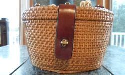 Found in box cleaning attic.First I have ever seen with rope handles.These were found in the 60's.Overall condition and patina are good.Condition of straw is excellent.Aigner is known for fine quality.Folks will take a second look when you walk down the
