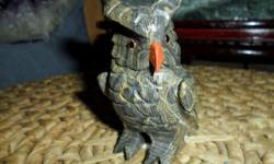 Exceptional Owl Carving-Stromatolite-This beautiful Owl carving made out of gem stone ? Stromatolite. This Owl carving is made by natives from the country Peru. Owl Symbolizes Intelligence and Wisdom. Colors light/dark brown, red, green. Stromatolites are
