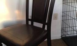 Paid roughly $600 for table, asking $250.
Table has a black finish, sturdy wood, extends from a small square table, to a larger rectangular table. Comes with 4 chairs. Very comfortable.
There are a few rips or holes in the chairs, but still very nice