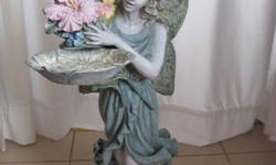 Beautiful hand sculpted & finely detailed 36" tall fairy statue for use indoors or outdoors. Excellent condition.
Great conversational piece for parties & home decor. Comes with a removable tray that sits in the fairy's hand. Place the statue in a corner