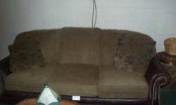 FAMILYROOM/LIVINGROOM SOFA IN BEIGE FABRIC WITH BROWN LEATHER ARMS IN GREAT CONDITION. RARELY SAT ON ASKING
100.00 845-522-7651 OR 845-591-0885