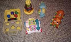Group 1) Toy phone, light up sea horse, pull ABC catapiller, Star stacker light up and sound, Little tikes shapes with light and sound. $10.00
Group 2) Mixer truck with plastic balls, dump truck, remote control train $8.00
Group 3) Little people farm