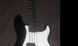 2003 Fender Squier Affinity Series P Bass Guitar for sale. Features black gloss finish with white pickguard, maple neck with rosewood fretboard. About 10 years old but still in excellent condition, very clean, smoke free home, never abused! Would be