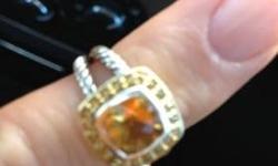 Stunning piece of jewelry to be added to a high end jewelry collection.
ALBION RING, CHAMPAGNE CITRINE, retails new starting @ $650.00
Designer: David Yurman, Size: I believe it to be 5.75. Sterling silver/18k gold.
Faceted champagne citrine.
Must see it
