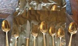 ESTATE SALE FIND! 50-PC "SUPREME VERMAI" Spanish Gold 24 kt Gold Electroplated Stainless Steel Flatware from the 1960s Set includes the following:
Eight 8.75-inch Dinner Knives
Eight 7.5-inch Dinner Forks
Eight 6.25-inch Salad / Dessert Forks
Eight 7-inch