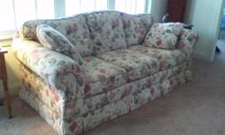 Floral-patterned couch and loveseat combo. The couch dimensions are 7'6" x 3'6", whereas the loveseat is 5'6" x 3'6." Both items are used but in good condition and without any staining. Available immediately!