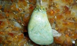 This is a Beautiful Fluorescent Light Green off White Sparkle Natural Moonstone Crystal Charm Gold Crown hand Crafted by Paulsgems Creations and has an Exceptional Shine. This Crystal Charm would look Beautiful on around your neck on your gold or silver